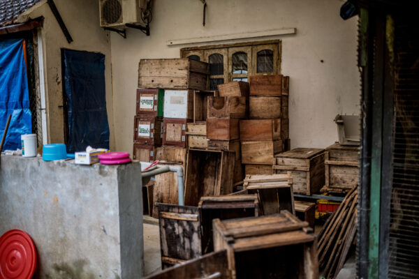 Empty wooden boxes use to house and transport pangolins.
