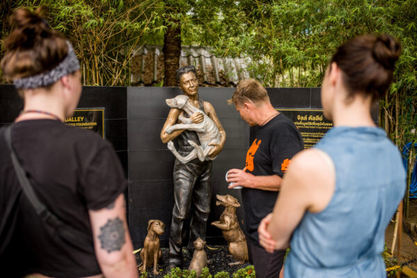  The foundation was founded in 2005 by British couple John and Gill Dalley. Gill passed away in 2017 from cancer but her spirit is still present at the foundation. A large statue of her sits next to their veterinarian hospital.  As of 2019 John remains fully involved in Soi Dog Foundation, honoring his commitment to Gill and the street dogs. 
