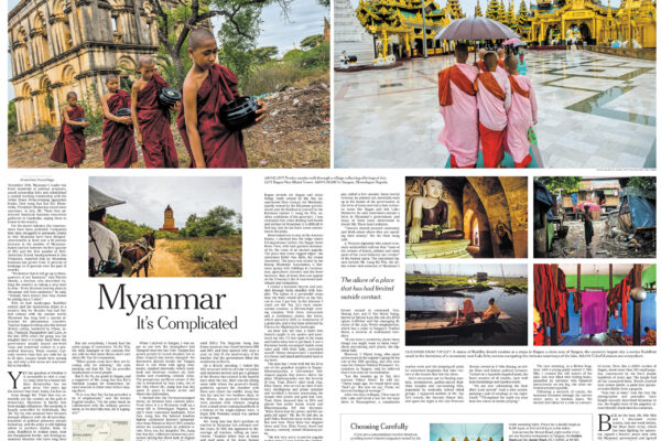 Double-page NYT spread on Myanmar: left page shows young monks with bowls near an old ruin; right page shows monks in pink robes near a gold temple courtyard.