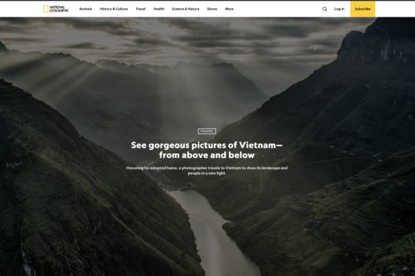 Dramatic mountain valley with a winding river, used as National Geographic Travel hero image about Vietnam from above and below.